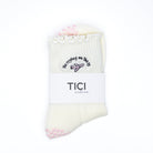 cream GRIP socks with pink GRIPS and 'TICI ACTIVE' branding on a white background. Non-slip socks for pilates, barre and yoga.