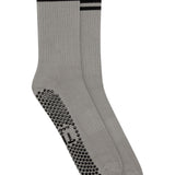 gray grip sock with black grips and stripes on a white background