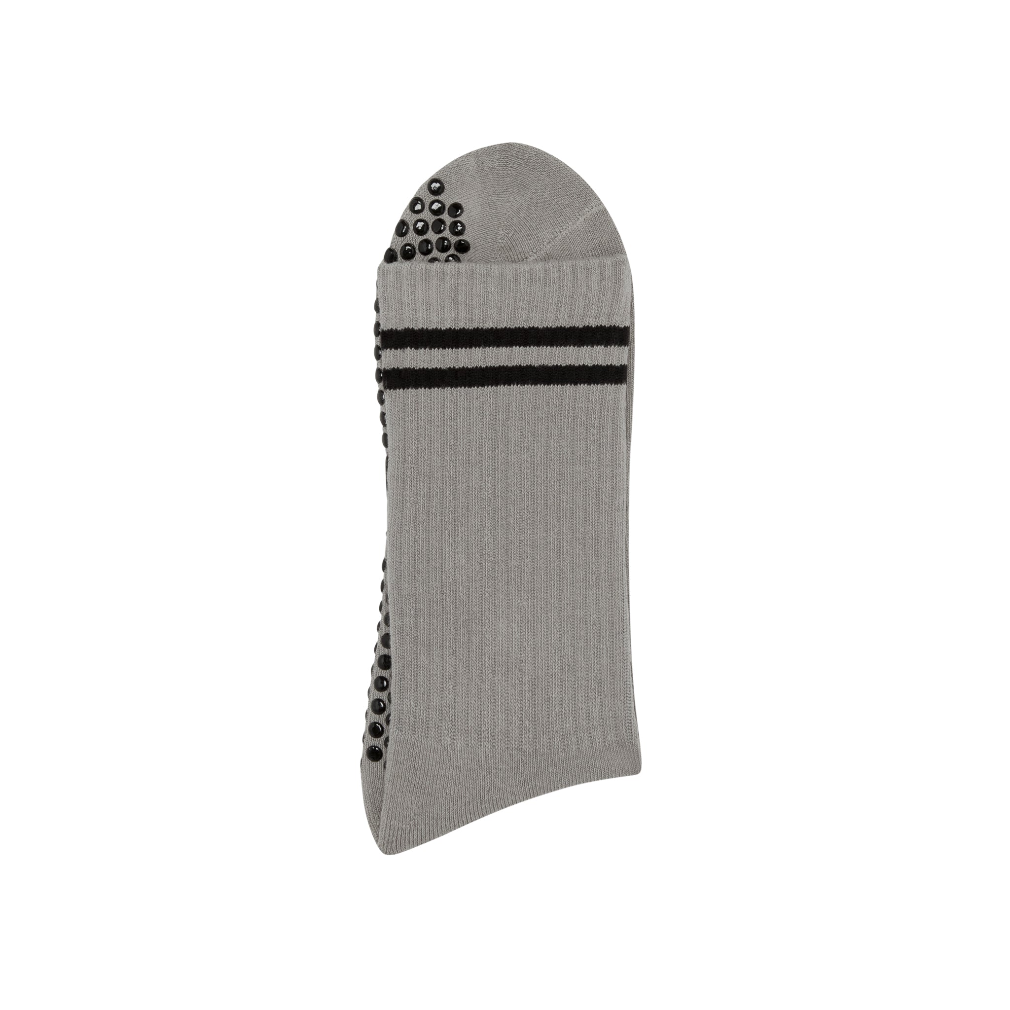 Gray grip socks with black grips and black stripes