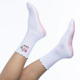 White socks with pink grips on a white background tici active grip socks 