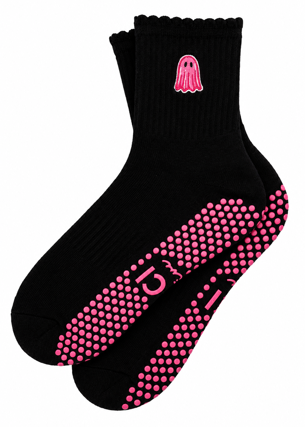 A pair of black ankle socks with pink grip dots on the sole and a pink ghost graphic on the cuff, displayed against a plain white background.