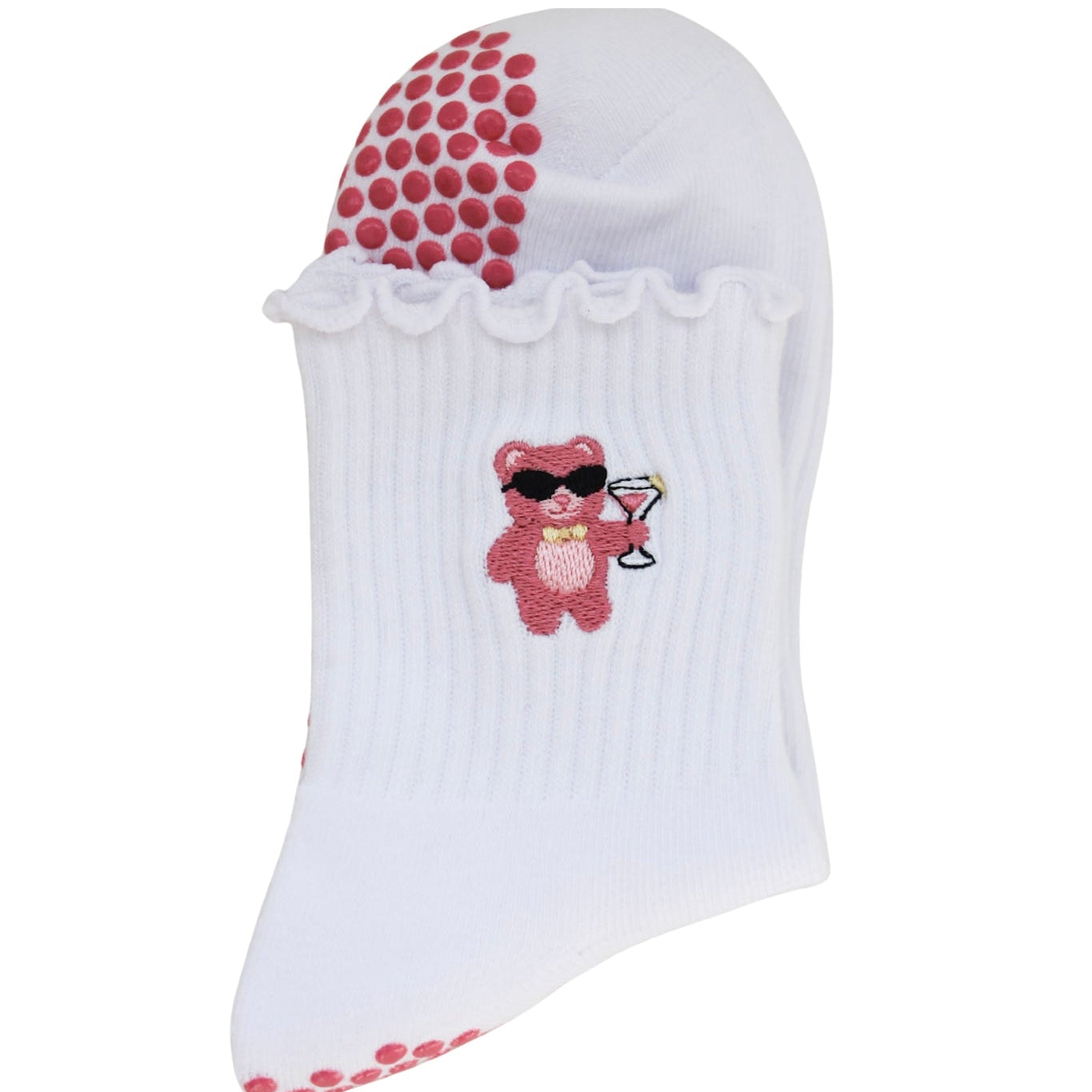 white pilates grip socks with pink grips. pink gummy bear holding a cosmopolitan. grip socks by TICI ACTIVE.