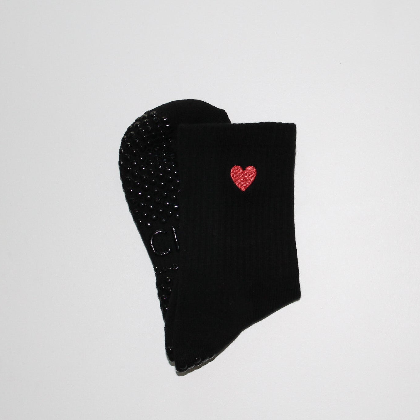 tici active valentines collection grip sock lover grip sock in black with black grips and red heart embroidery.