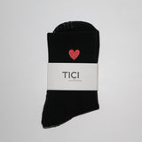 tici active valentines collection grip sock lover grip sock in black with black grips and red heart embroidery.