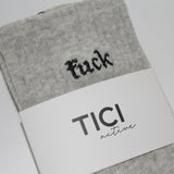 Gray grip socks with black text and 'TICI ACTIVE'  branding on a white background. Grip socks are heather gray with black grips. 
