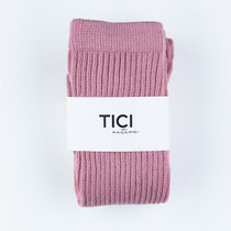 Pink scrunch grip socks with a white label featuring 'TICI active' on a light gray background. 