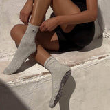 fitness model, gray grip socks, black grips